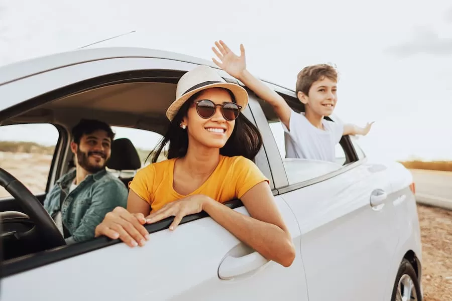A family sets out on a road trip in a vehicle they purchased with a credit union auto loan.